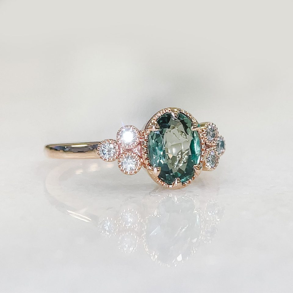 Ring With 8X6MM Oval Green Sapphire And .15 Carat TW Of Diamonds In 14kt Rose Gold