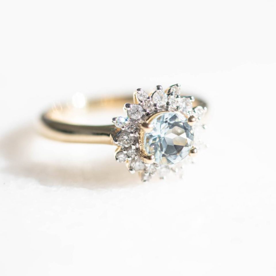 Ring With 6MM Round Aquamarine And .30 Carat TW Of Diamonds In 14kt Yellow Gold