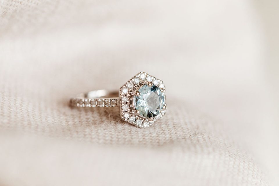 Ring with 7MM Round Aquamarine and .45 Carat TW of Diamonds in 14kt White Gold