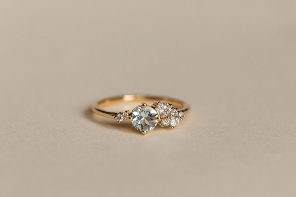 Ring with 5MM Aquamarine and .20 Carat TW of Diamonds in 14kt Yellow Gold