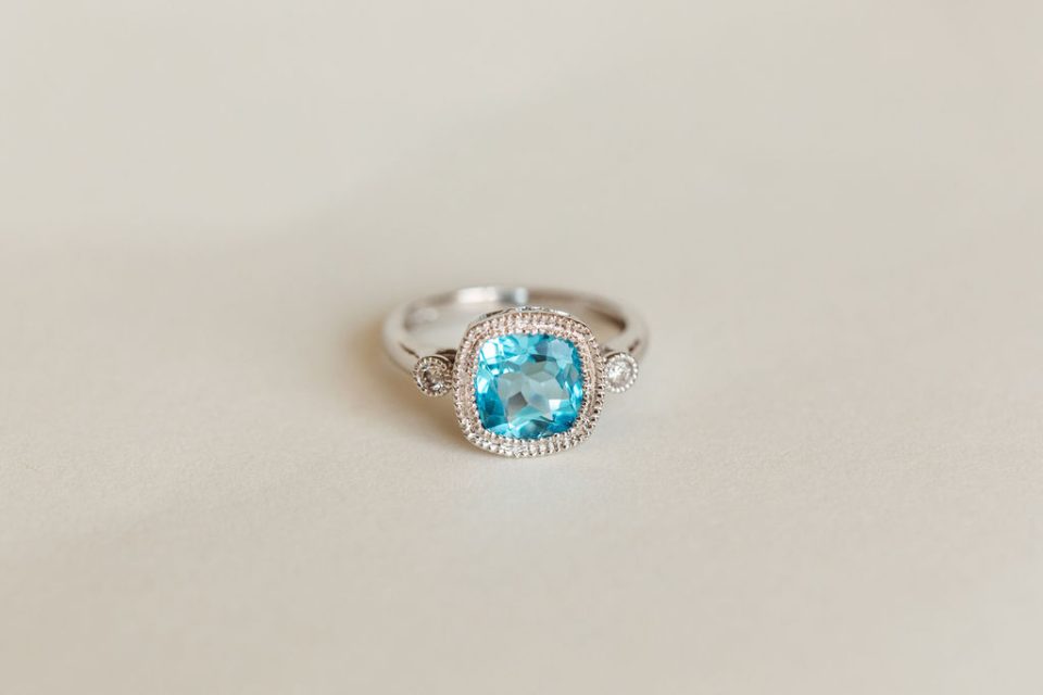 Ring 8MM Blue Topaz and .07Carat TW Diamonds in 14kt White Gold