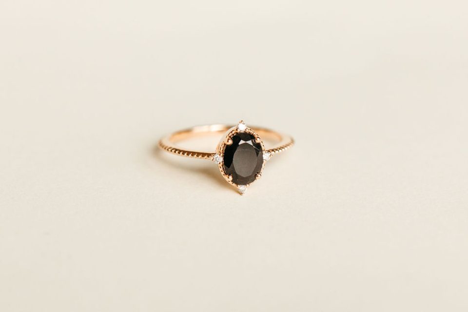 Ring with 8X6MM Oval Black Onyx and .06 Carat TW Diamonds in 10kt Rose Gold