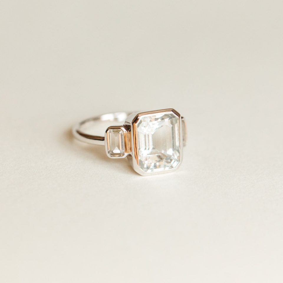 Ring With 10X8MM Emerald Cut Aquamarine And White Topaz In 10kt White Gold