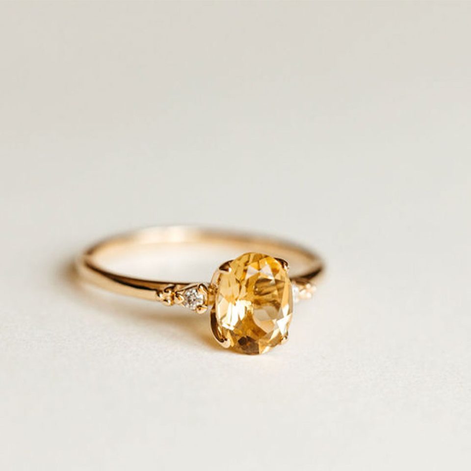 Ring With 8X6MM Oval Champagne Quartz And .04 Carat TW Of Diamonds In 14kt Yellow Gold