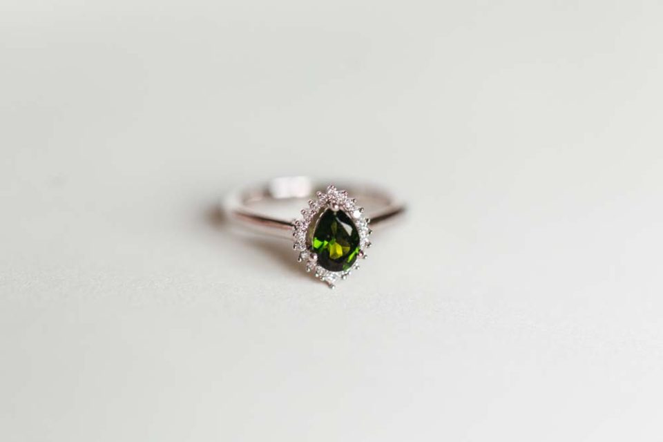 Ring with 7X5MM Pear Shaped Green Tourmaline and .10 Carat TW of Diamonds in 14kt White Gold