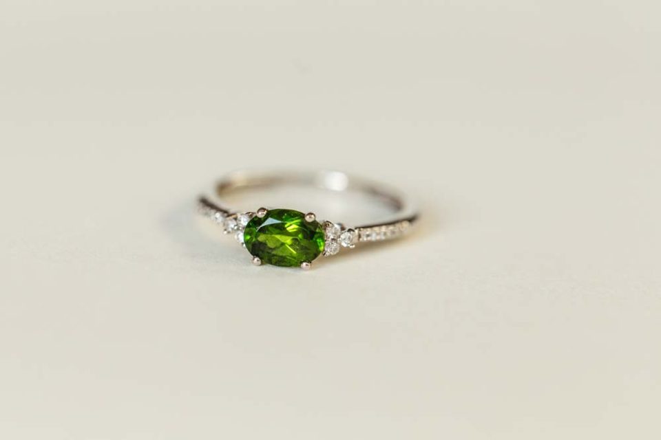 Ring with Oval 7X5MM Green Tourmaline and .10 Carat TW of Diamonds in 14kt White Gold