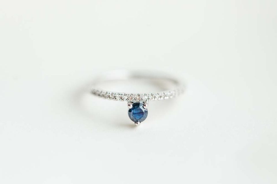 Ring with 3.8MM Round Blue Sapphire and .12 Carat TW of Diamonds in 14kt White Gold
