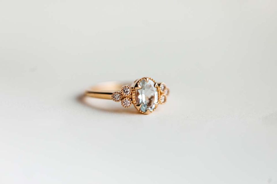 Ring with 8X6MM Oval Aquamarine and .15 Carat TW of Diamonds in 14kt Yellow Gold