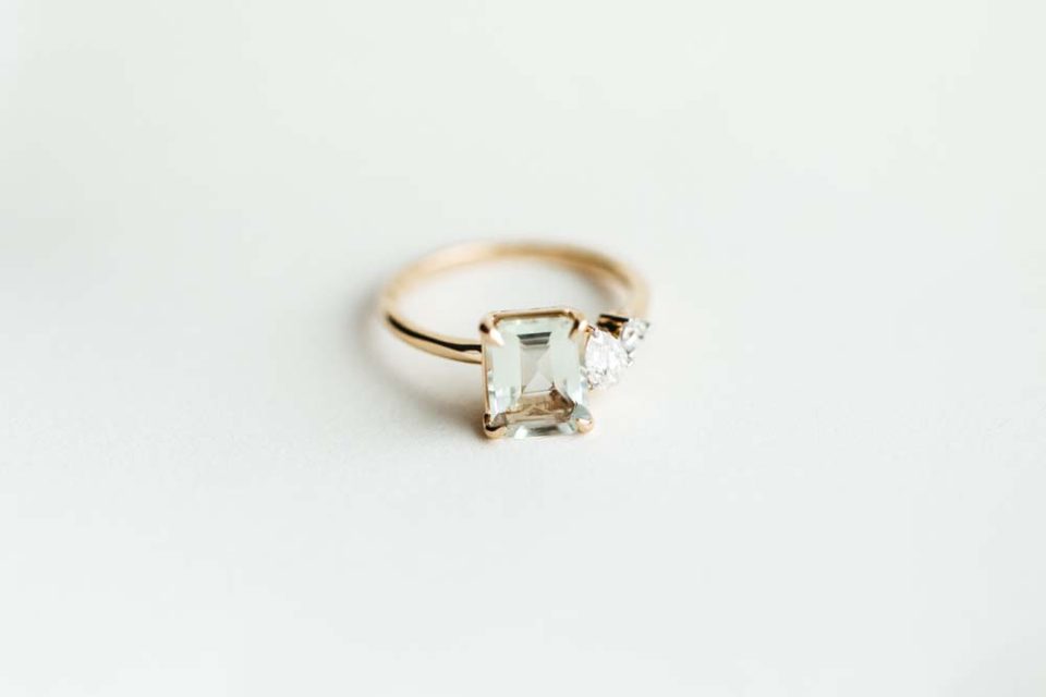 Ring with 9X7MM Emerald Cut Green Amethyst and .33 Carat TW of Diamonds in 14kt Yellow Gold