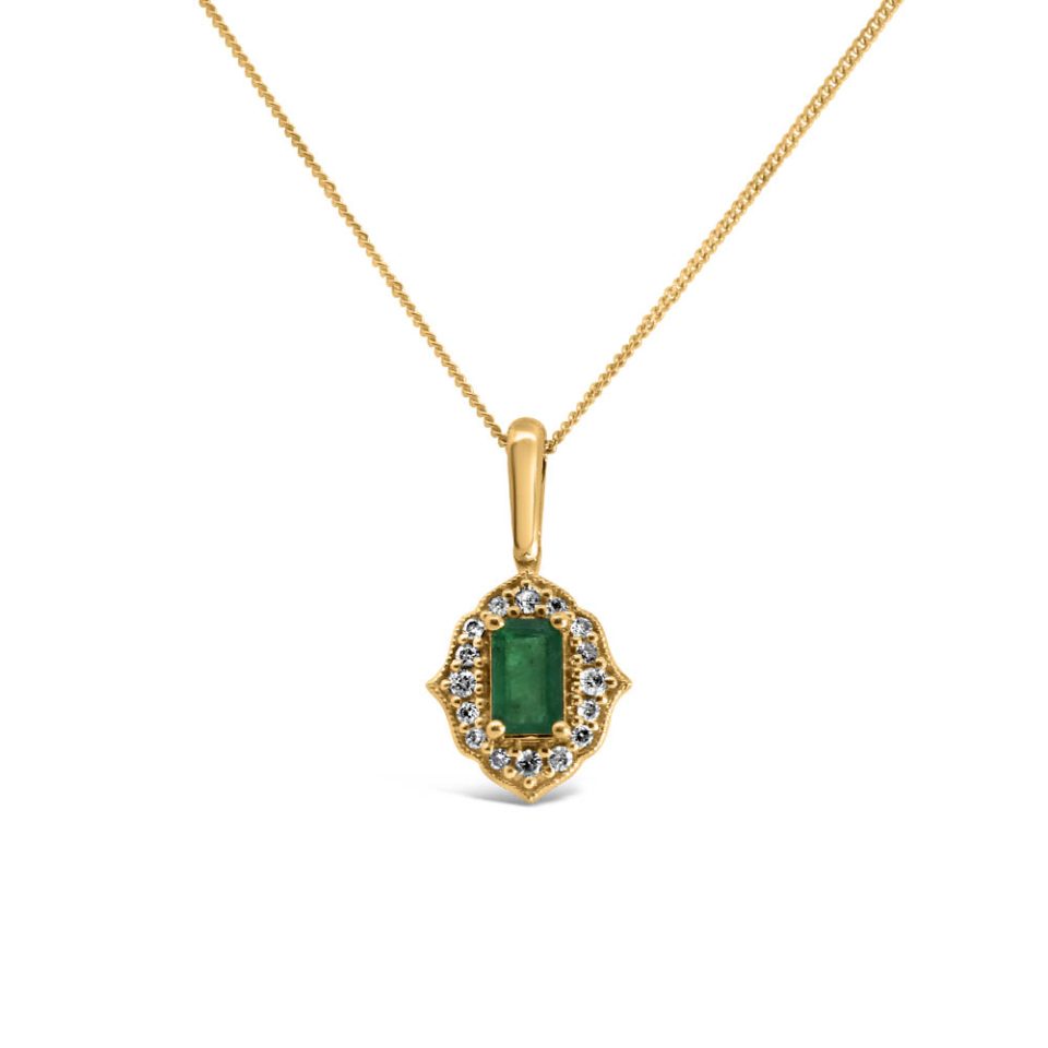 5X3MM Pendant with Emerald and .09 Carat TW of Diamonds in 10kt Yellow Gold